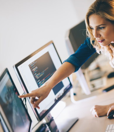 Two team members working on improving software quality